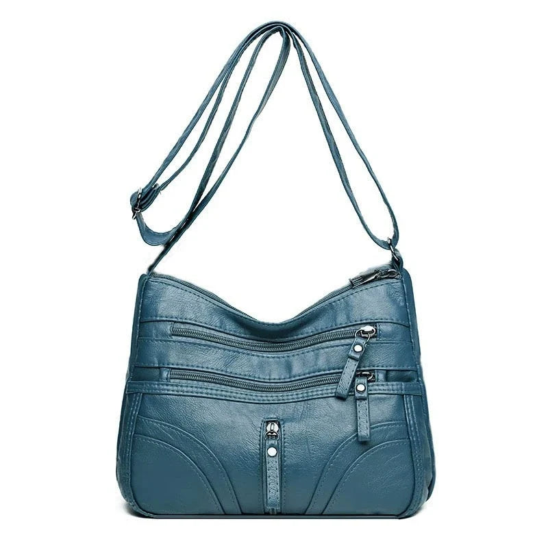 Nova coleção de bolsas de exportação transfronteiriça. A bolsa feminina mais fácil de combinar, bolsa tiracolo, bolsa de ombro de grande capacidade com textura de couro macio e moderna, bolsa de vestuário feminino.