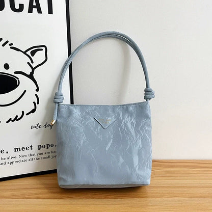 Bolsa de ombro casual feminina, versátil e charmosa. Bolsa tiracolo para o trabalho, elegante e ideal para o dia a dia. Bolsa de axila versátil para atacado.