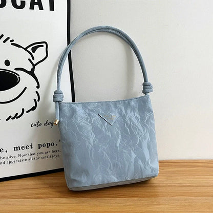 Bolsa de ombro casual feminina, versátil e charmosa. Bolsa tiracolo para o trabalho, elegante e ideal para o dia a dia. Bolsa de axila versátil para atacado.