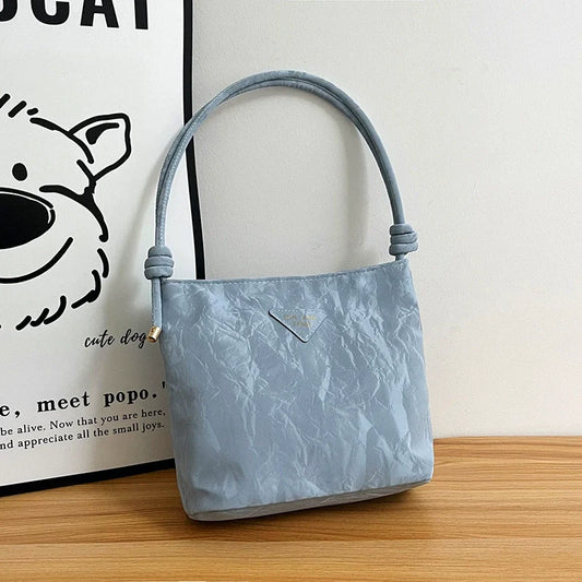 Bolsa de ombro casual feminina, versátil e charmosa. Bolsa tiracolo para o trabalho, elegante e ideal para o dia a dia. Bolsa de axila versátil para atacado.
