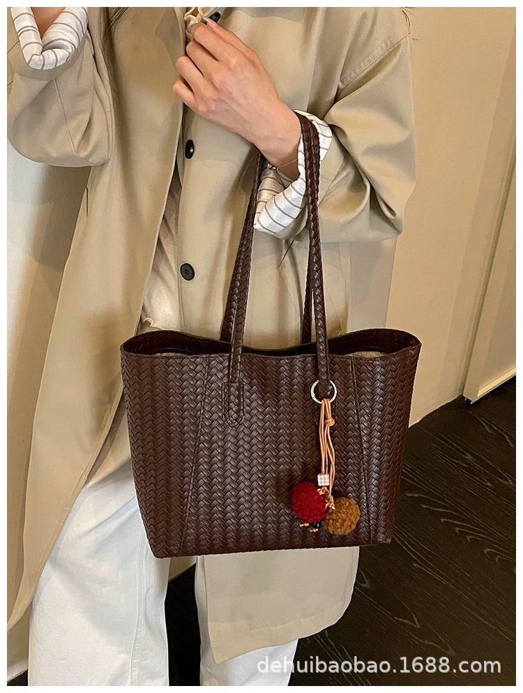 Bolsa de tecido retrô transfronteiriça para mulheres, nova moda outono antecipado 2026, bolsa de ombro de grande capacidade, bolsa tote para uso diário.