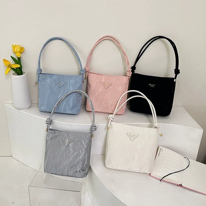 Bolsa de ombro casual feminina, versátil e charmosa. Bolsa tiracolo para o trabalho, elegante e ideal para o dia a dia. Bolsa de axila versátil para atacado.