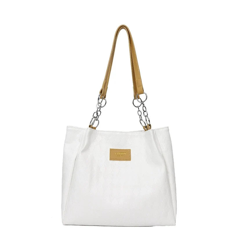 Nova bolsa tote feminina, grande capacidade, bolsa de ombro. Super fácil de combinar com looks de trabalho. Estilo coreano, design diferenciado e moderno.