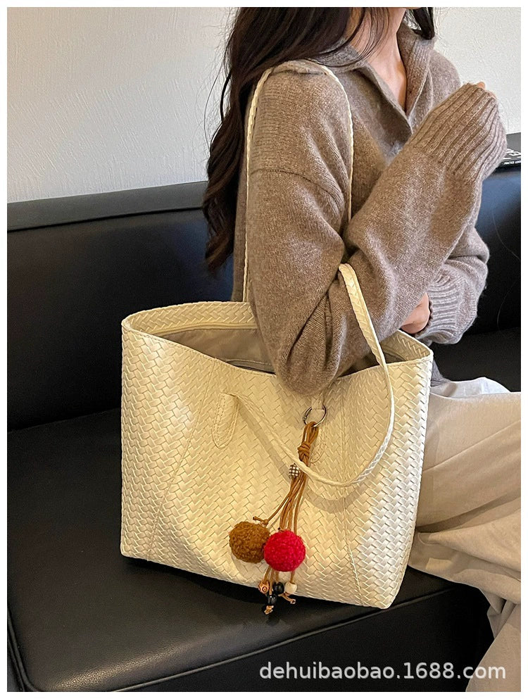 Bolsa de tecido retrô transfronteiriça para mulheres, nova moda outono antecipado 2026, bolsa de ombro de grande capacidade, bolsa tote para uso diário.