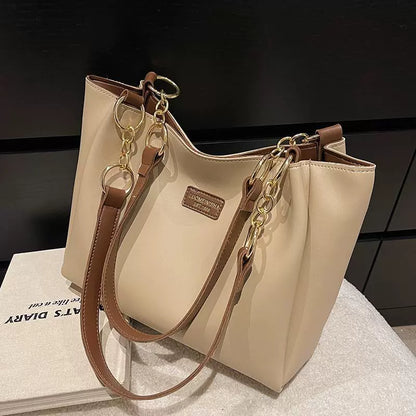Bolsas femininas de grande capacidade populares deste ano, nova moda 2025, luxo leve, alta qualidade, acessível, bolsa tote de ombro único para o dia a dia.