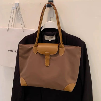 Bolsa tote prática de grande capacidade para estudantes femininas, versátil para deslocamentos, bolsa feminina de ombro único em tecido Oxford e nylon, bolsa tote transfronteiriça.