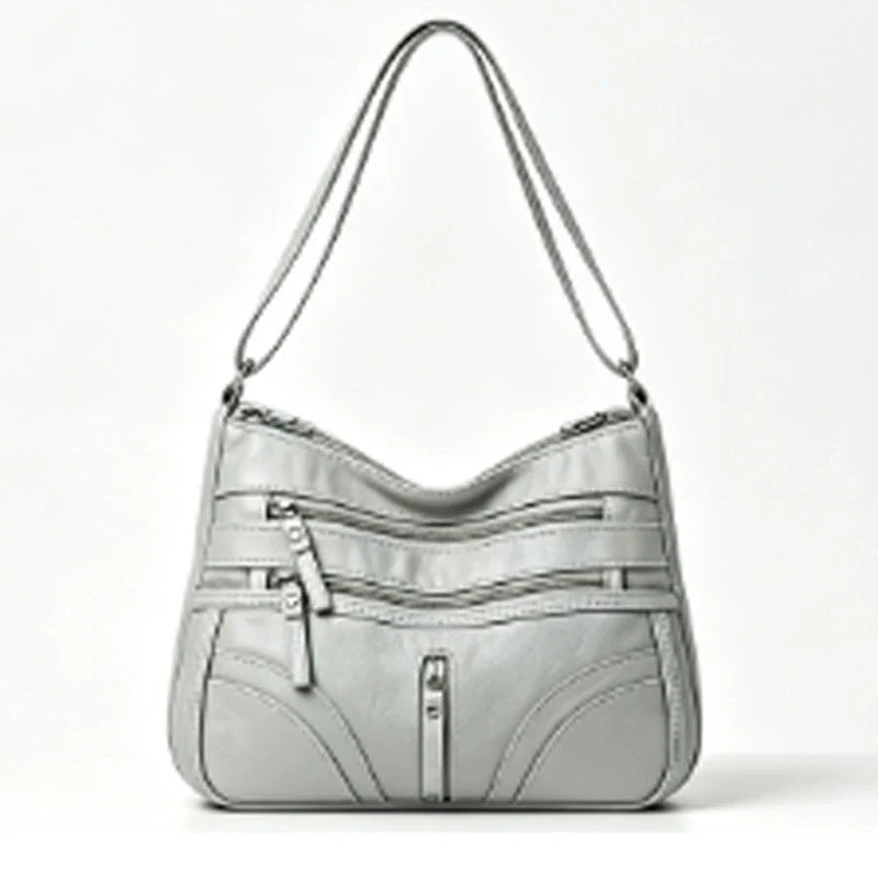 Nova coleção de bolsas de exportação transfronteiriça. A bolsa feminina mais fácil de combinar, bolsa tiracolo, bolsa de ombro de grande capacidade com textura de couro macio e moderna, bolsa de vestuário feminino.