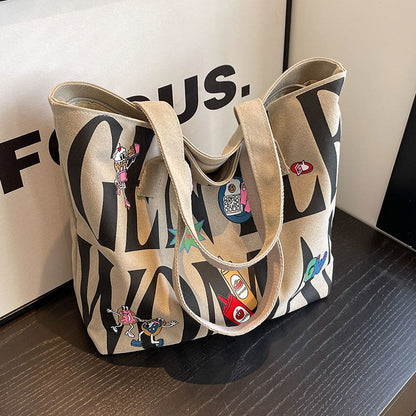 Bolsa de Lona com Letras Feminina Grande Capacidade 2026 Nova Bolsa Tote Casual Bolsa de Ombro Escolar para Estudantes