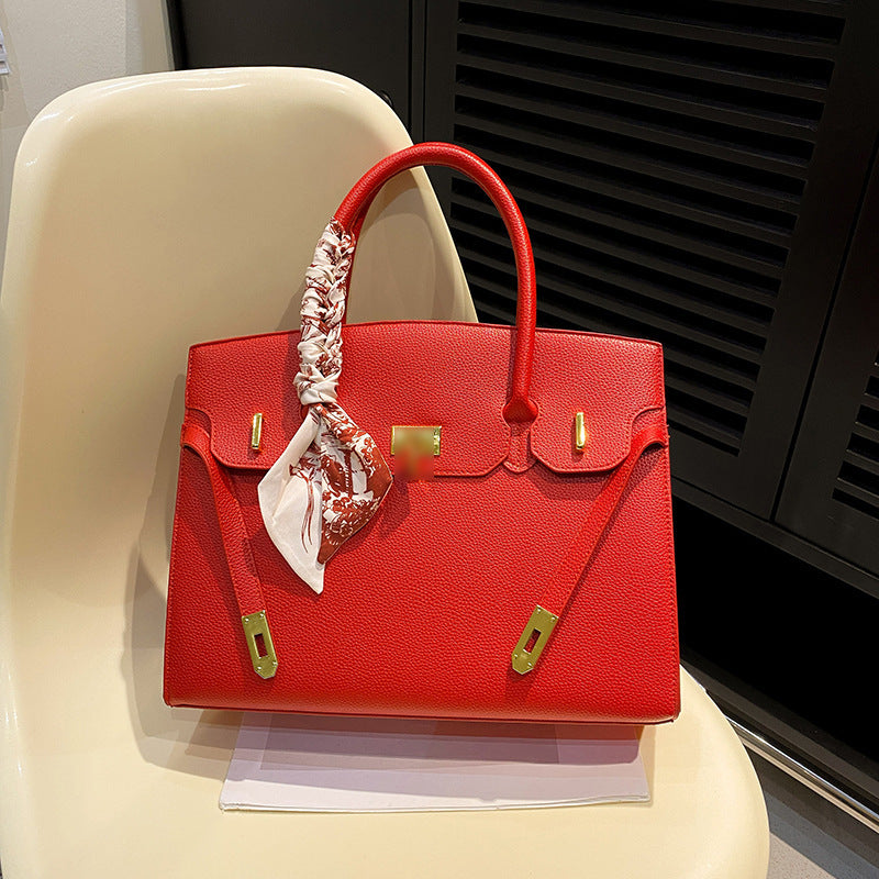 Bolsa Kelly de Grande Capacidade Feminina 2026 Nova ColeçãoEstilo de NichoLuxo AcessívelBolsa de Ombro para TrabalhoBolsa Satchel Feminina Elegante