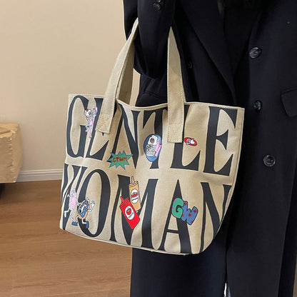 Bolsa de Lona com Letras Feminina Grande Capacidade 2026 Nova Bolsa Tote Casual Bolsa de Ombro Escolar para Estudantes