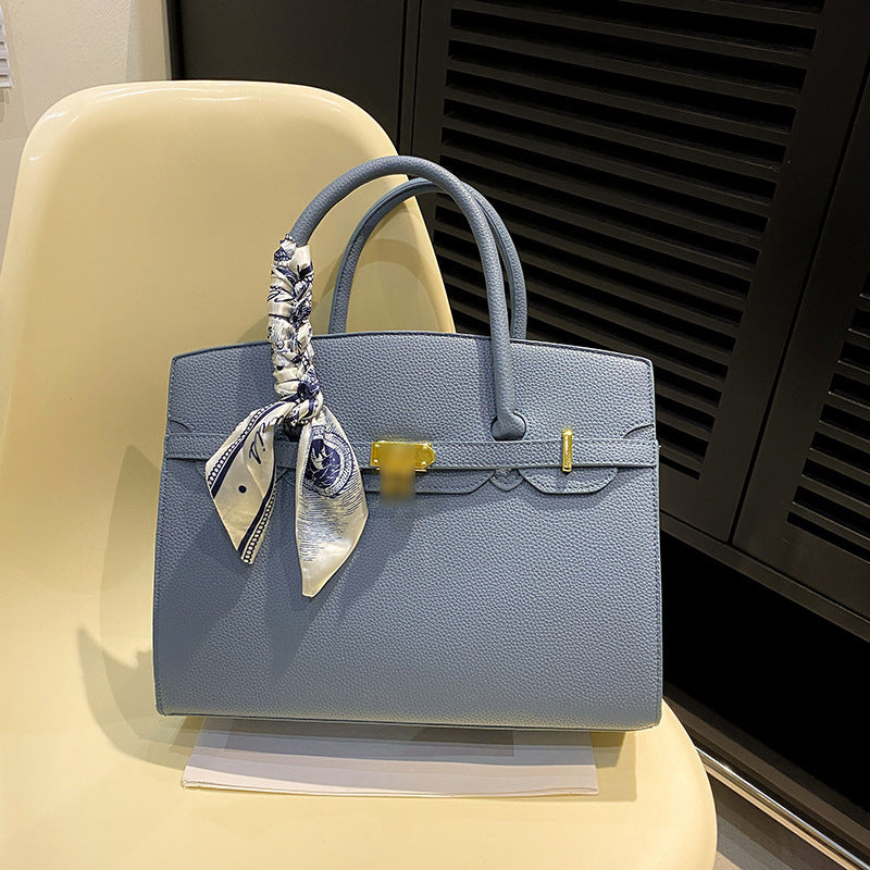 Bolsa Kelly de Grande Capacidade Feminina 2026 Nova ColeçãoEstilo de NichoLuxo AcessívelBolsa de Ombro para TrabalhoBolsa Satchel Feminina Elegante