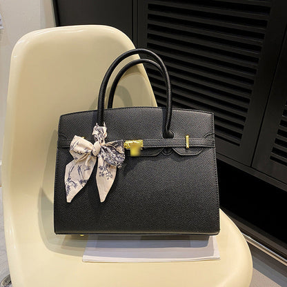 Bolsa Kelly de Grande Capacidade Feminina 2026 Nova ColeçãoEstilo de NichoLuxo AcessívelBolsa de Ombro para TrabalhoBolsa Satchel Feminina Elegante