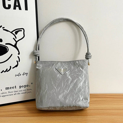 Bolsa de ombro casual feminina, versátil e charmosa. Bolsa tiracolo para o trabalho, elegante e ideal para o dia a dia. Bolsa de axila versátil para atacado.