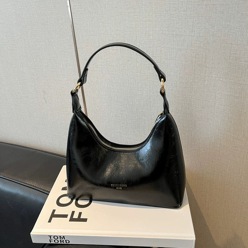 Bolsa de couro texturizado a óleo para atacado internacional, feminina, nova coleção 2026, moda, mais fácil de combinar, bolsa tiracolo, de ombro, pequena, para usar embaixo do braço.