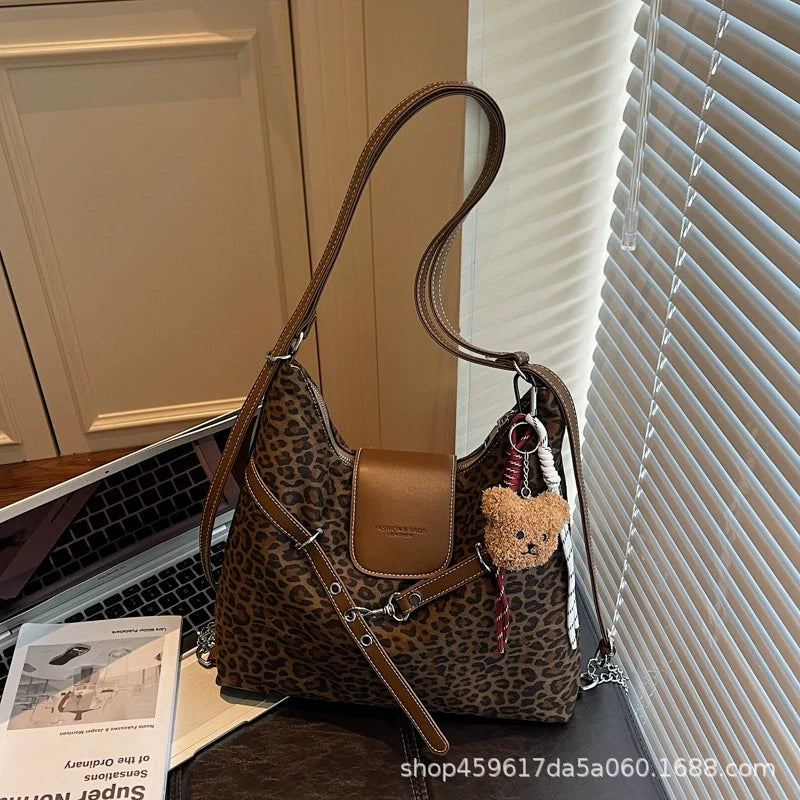 Bolsa de Ombro Feminina Estampa de Leopardo 2025 Nova Moda Bolsa de Axila Preguiçosa Bolsa Tote Feminina Bolsa de Ombro Transversal Bolsa Concha