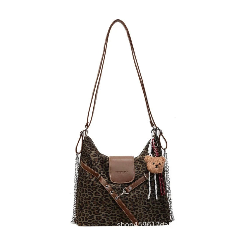 Bolsa de Ombro Feminina Estampa de Leopardo 2025 Nova Moda Bolsa de Axila Preguiçosa Bolsa Tote Feminina Bolsa de Ombro Transversal Bolsa Concha