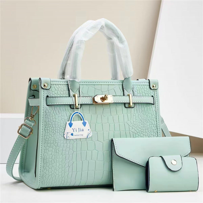 Bolsa de mão nova padrão de pedra bolsa para sogra cor pura design moderno exportação taizhou bolsa feminina bolsas transfronteiriças