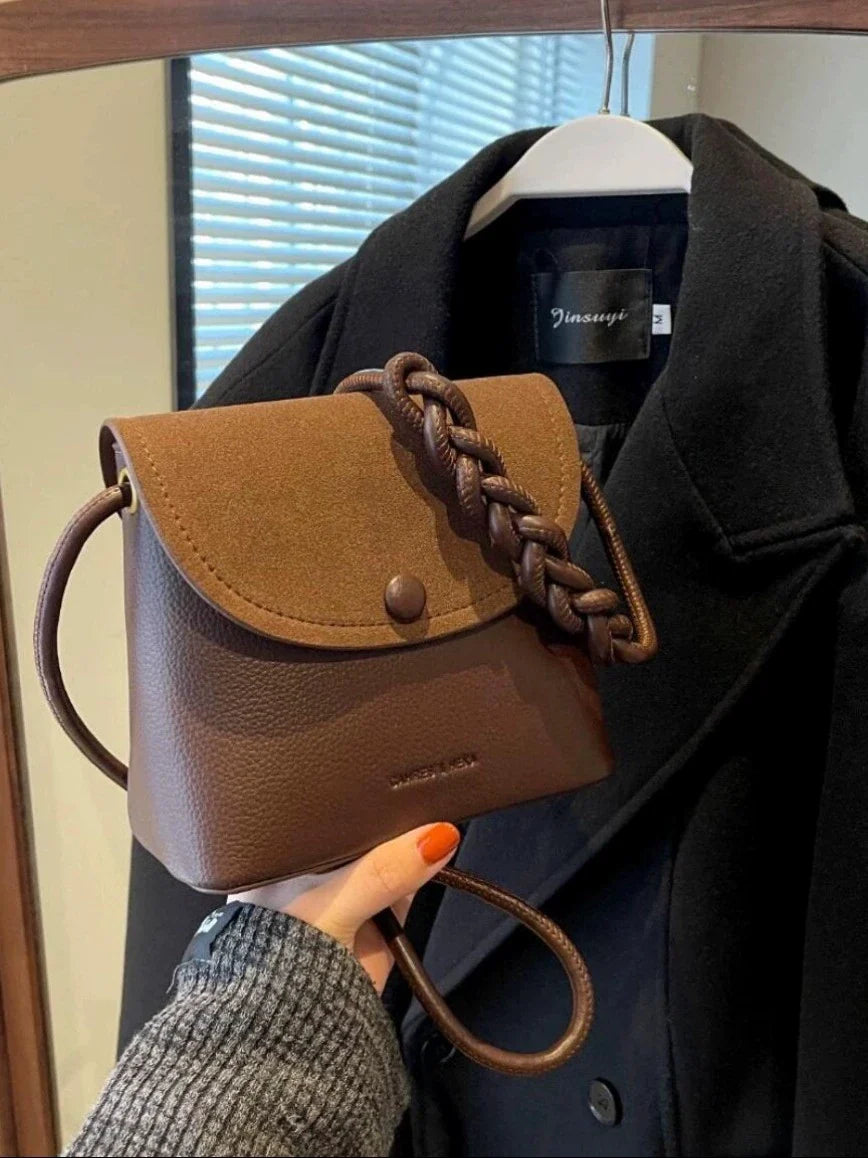 Bolsa feminina de alta qualidade 2024 nova bolsa transversal outono e inverno bolsa saco design retrô nicho bolsa de ombro versátil feminina.