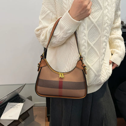 Bolsa transversal xadrez para mulheres 2026. Nova coleção. Estilo nicho, bolsa de ombro de luxo leve. Moda. Bolsa de mão transversal com senso de elegância.