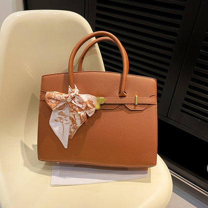Bolsa Kelly de Grande Capacidade Feminina 2026 Nova ColeçãoEstilo de NichoLuxo AcessívelBolsa de Ombro para TrabalhoBolsa Satchel Feminina Elegante