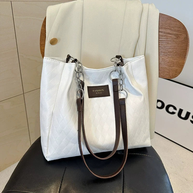 Nova bolsa tote feminina, grande capacidade, bolsa de ombro. Super fácil de combinar com looks de trabalho. Estilo coreano, design diferenciado e moderno.