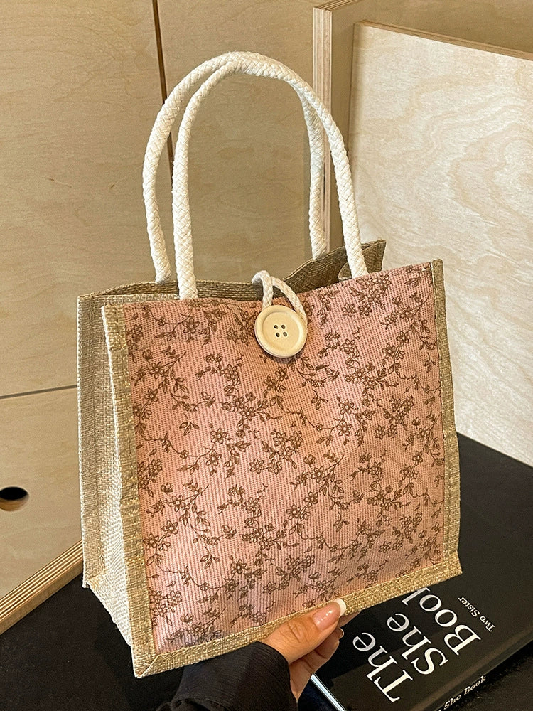 Bolsa de almoço de mão floral estilo francês de verão 2025 bolsa de mão versátil para menina japonesa ins escritório deslocamento.