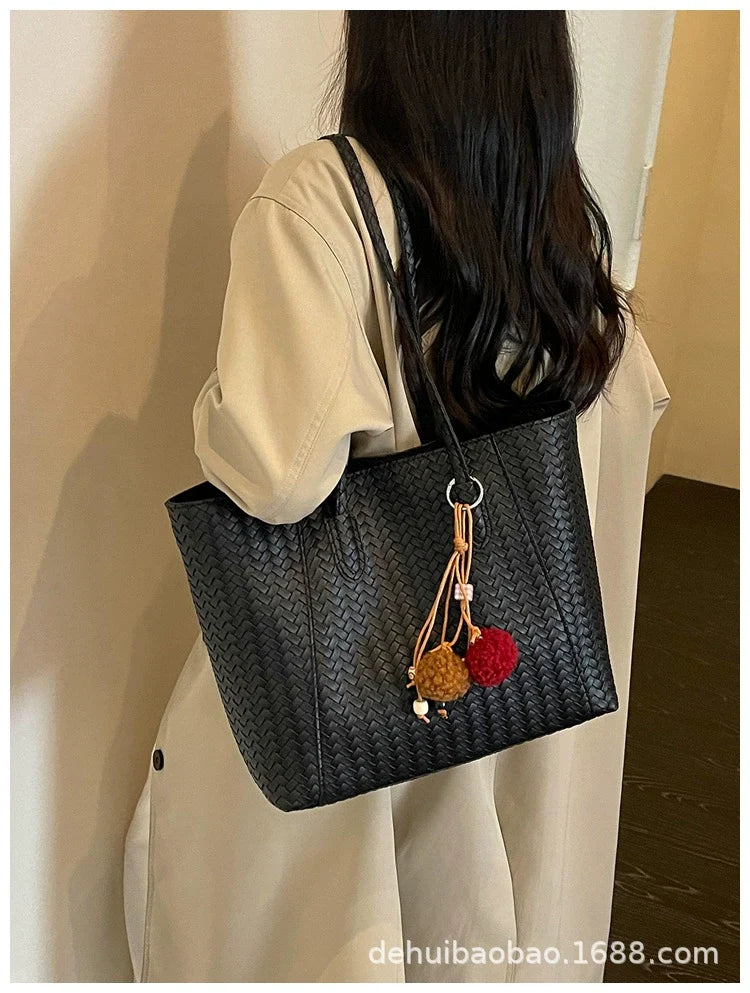 Bolsa de tecido retrô transfronteiriça para mulheres, nova moda outono antecipado 2026, bolsa de ombro de grande capacidade, bolsa tote para uso diário.