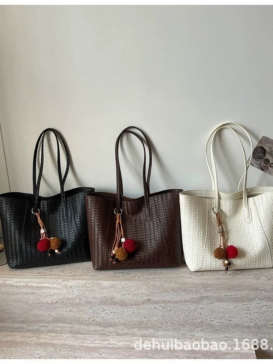 Bolsa de tecido retrô transfronteiriça para mulheres, nova moda outono antecipado 2026, bolsa de ombro de grande capacidade, bolsa tote para uso diário.
