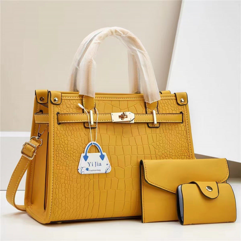 Bolsa de mão nova padrão de pedra bolsa para sogra cor pura design moderno exportação taizhou bolsa feminina bolsas transfronteiriças