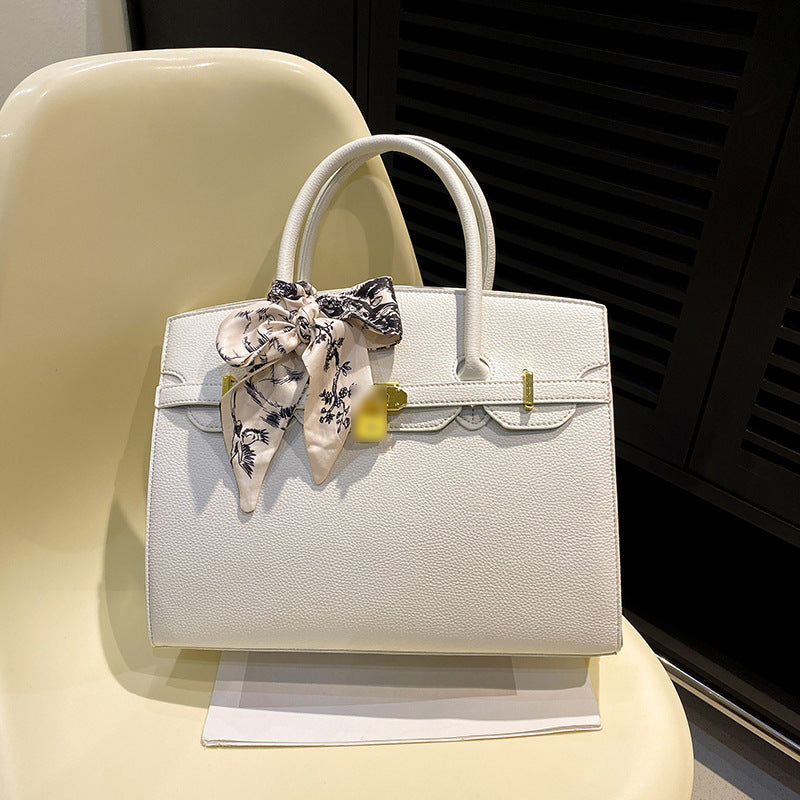 Bolsa Kelly de Grande Capacidade Feminina 2026 Nova ColeçãoEstilo de NichoLuxo AcessívelBolsa de Ombro para TrabalhoBolsa Satchel Feminina Elegante