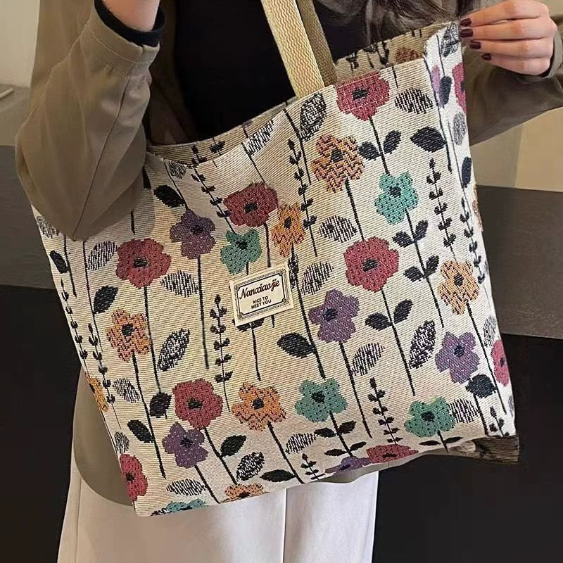 Bolsa de Ombro Feminina Estilo Nicho de Grande Capacidade 2025 Nova Coleção Bolsa de Lona Sacola Clássica Bolsa de Trabalho Bolsa Tote para Roupas