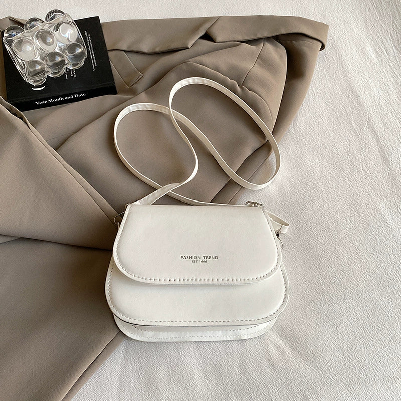 Bolsa de ombro versátil nova de outono e inverno em cores doces, bolsa de sela moderna, fresca e de alto padrão, bolsa transversal para mulheres