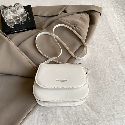 Bolsa de ombro versátil nova de outono e inverno em cores doces, bolsa de sela moderna, fresca e de alto padrão, bolsa transversal para mulheres