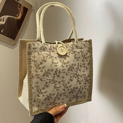Bolsa de almoço de mão floral estilo francês de verão 2025 bolsa de mão versátil para menina japonesa ins escritório deslocamento.