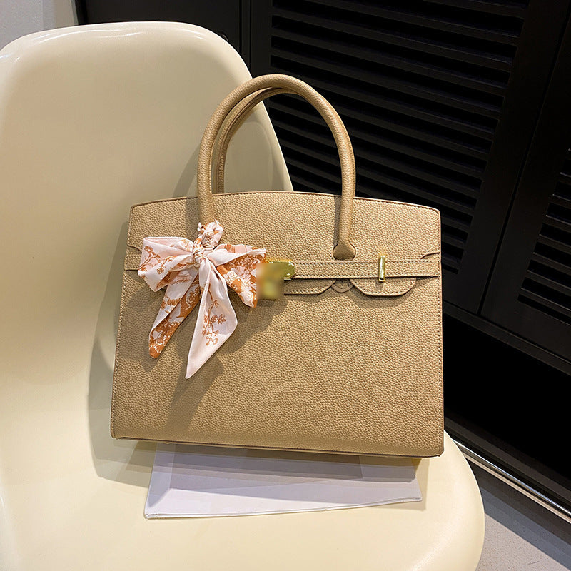 Bolsa Kelly de Grande Capacidade Feminina 2026 Nova ColeçãoEstilo de NichoLuxo AcessívelBolsa de Ombro para TrabalhoBolsa Satchel Feminina Elegante