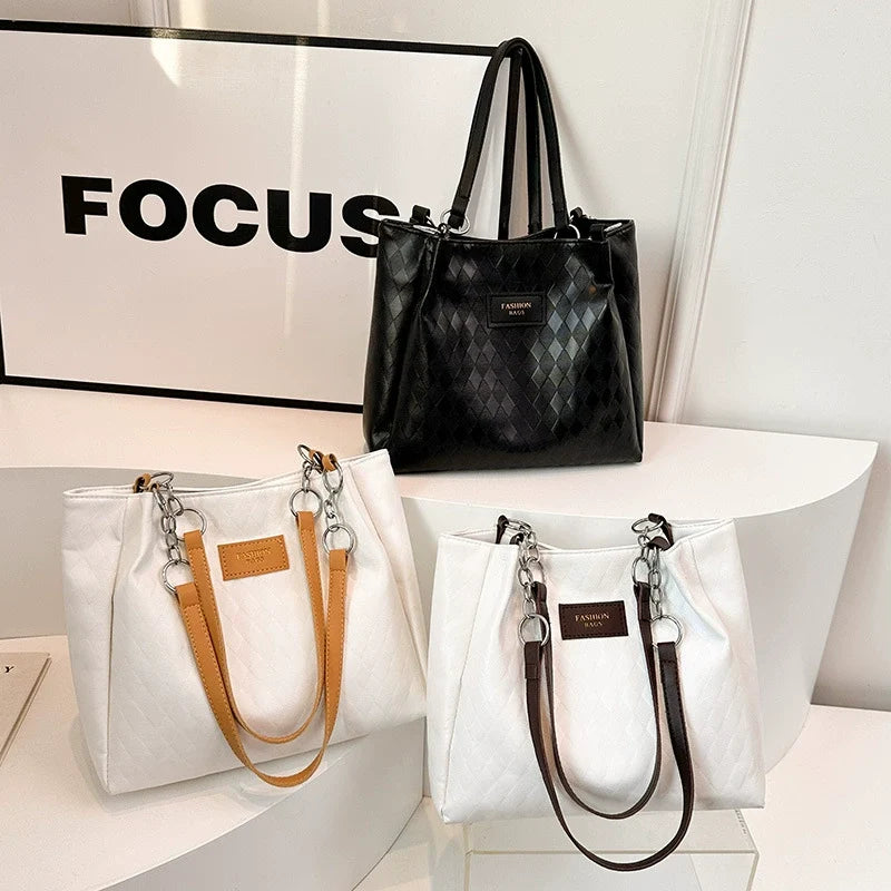 Nova bolsa tote feminina, grande capacidade, bolsa de ombro. Super fácil de combinar com looks de trabalho. Estilo coreano, design diferenciado e moderno.