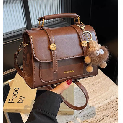 Bolsa pequena retrô de textura sofisticada, nova bolsa transversal versátil feminina, bolsa quadrada pequena de mão super moderna e popular.