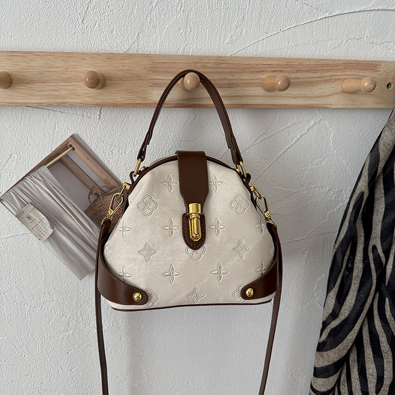 Bolsas femininas de luxo transfronteiriças 2026: Nova tendência, bolsa de mão e transversal versátil e moderna com textura simples e alça de ombro.