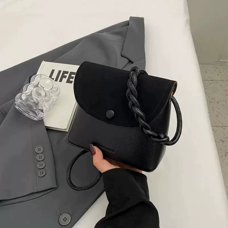 Bolsa feminina de alta qualidade 2024 nova bolsa transversal outono e inverno bolsa saco design retrô nicho bolsa de ombro versátil feminina.