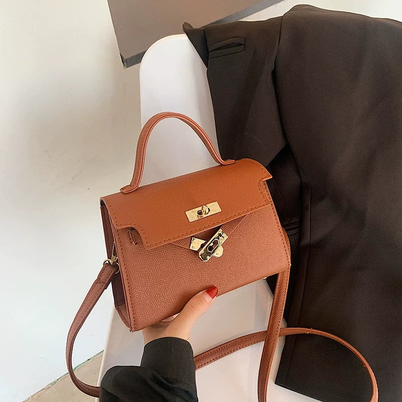 Nova Bolsa Feminina Versátil 2026: Bolsa Retrô Kelly de Ombro Único Transversal Pequena Quadrada – Atacado