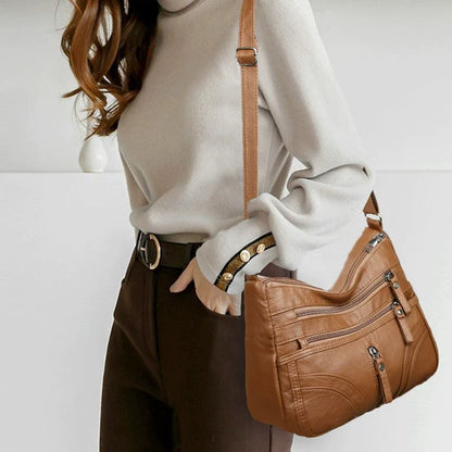 Nova coleção de bolsas de exportação transfronteiriça. A bolsa feminina mais fácil de combinar, bolsa tiracolo, bolsa de ombro de grande capacidade com textura de couro macio e moderna, bolsa de vestuário feminino.