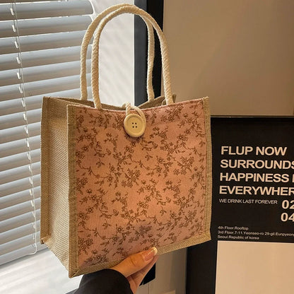 Bolsa de almoço de mão floral estilo francês de verão 2025 bolsa de mão versátil para menina japonesa ins escritório deslocamento.