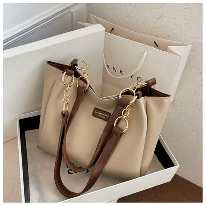 Bolsas femininas de grande capacidade populares deste ano, nova moda 2025, luxo leve, alta qualidade, acessível, bolsa tote de ombro único para o dia a dia.
