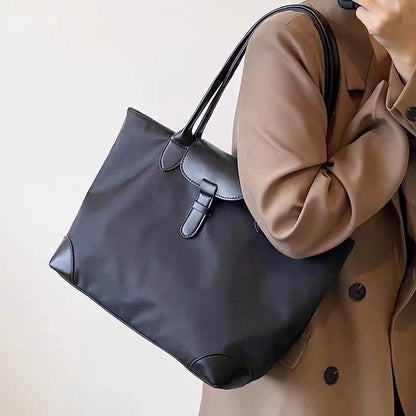 Bolsa tote prática de grande capacidade para estudantes femininas, versátil para deslocamentos, bolsa feminina de ombro único em tecido Oxford e nylon, bolsa tote transfronteiriça.