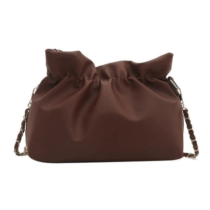 Bolsa de textura de nicho para mulheres 2024 nova bolsa de ombro versátil de verão com corrente transversal bolsa de nuvem plissada de alta qualidade.