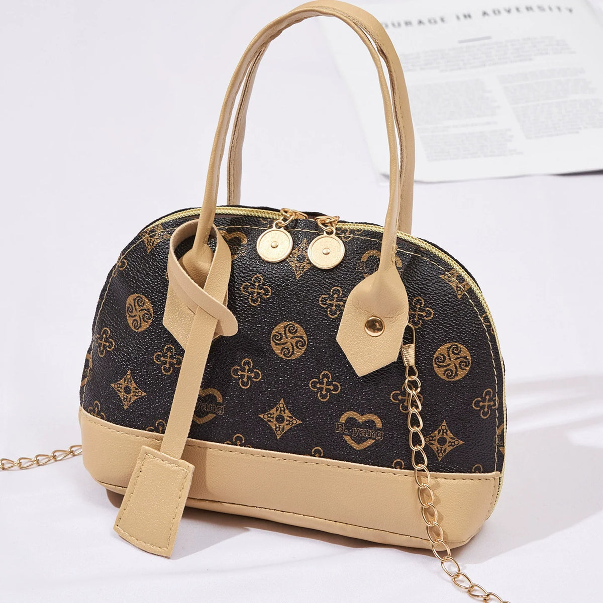 2026 Nova Moda, Luxo Leve, Niche Monica & Friends Bolsa Feminina de Alto Padrão - Bolsa Shell com Bloco de Cores Estampado