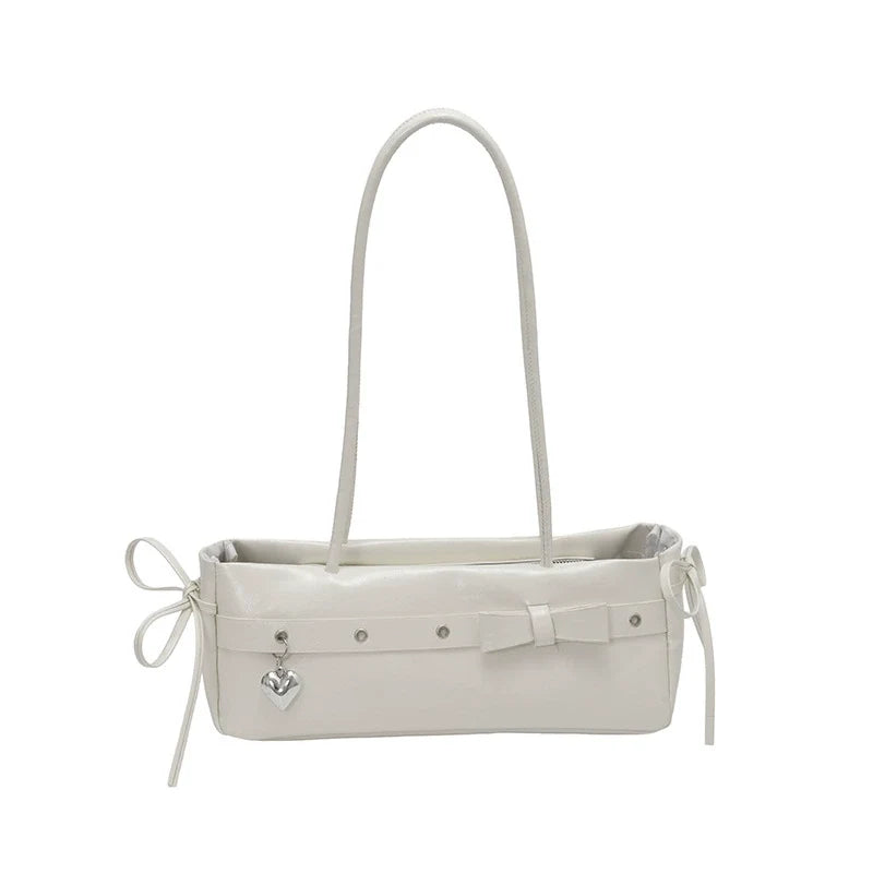 Bolsa baguete de alto estilo para mulheres, uma bolsa de ombro de couro fresca e versátil, uma bolsa moderna e versátil para mulheres jovens.