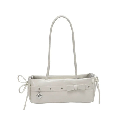 Bolsa baguete de alto estilo para mulheres, uma bolsa de ombro de couro fresca e versátil, uma bolsa moderna e versátil para mulheres jovens.
