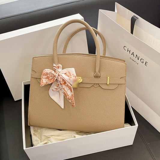 Bolsa Kelly de Grande Capacidade Feminina 2026 Nova ColeçãoEstilo de NichoLuxo AcessívelBolsa de Ombro para TrabalhoBolsa Satchel Feminina Elegante
