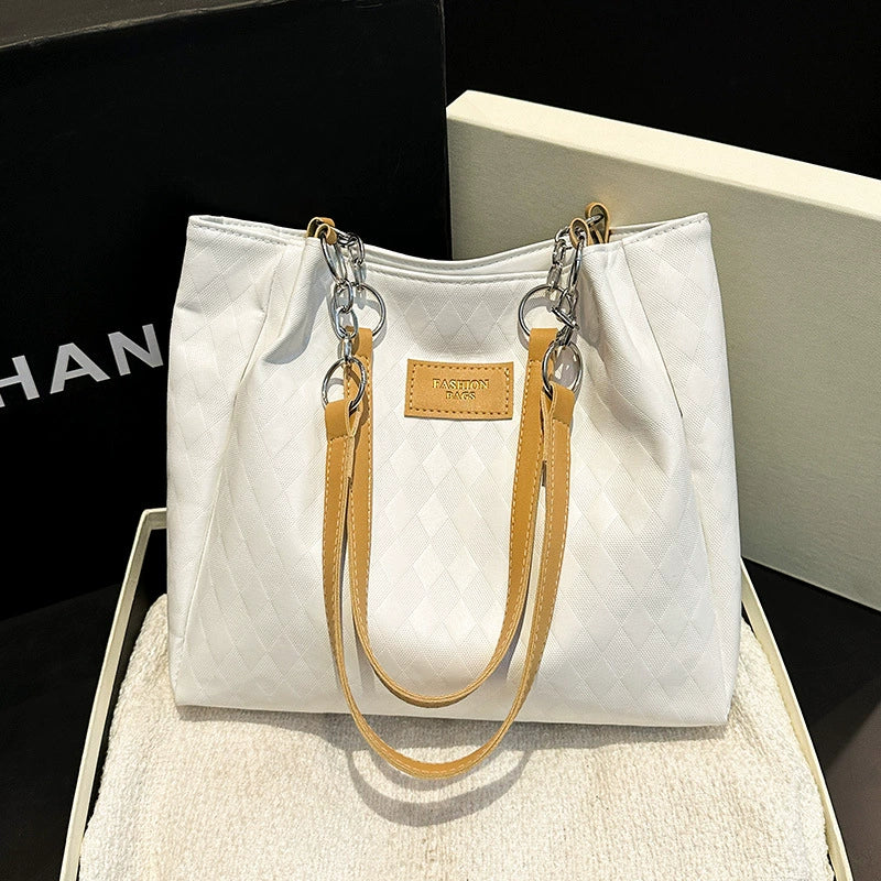 Nova bolsa tote feminina, grande capacidade, bolsa de ombro. Super fácil de combinar com looks de trabalho. Estilo coreano, design diferenciado e moderno.